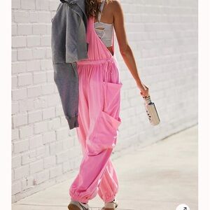 Free people infinity onesie- Pink Lemonade- Size XS but very oversized